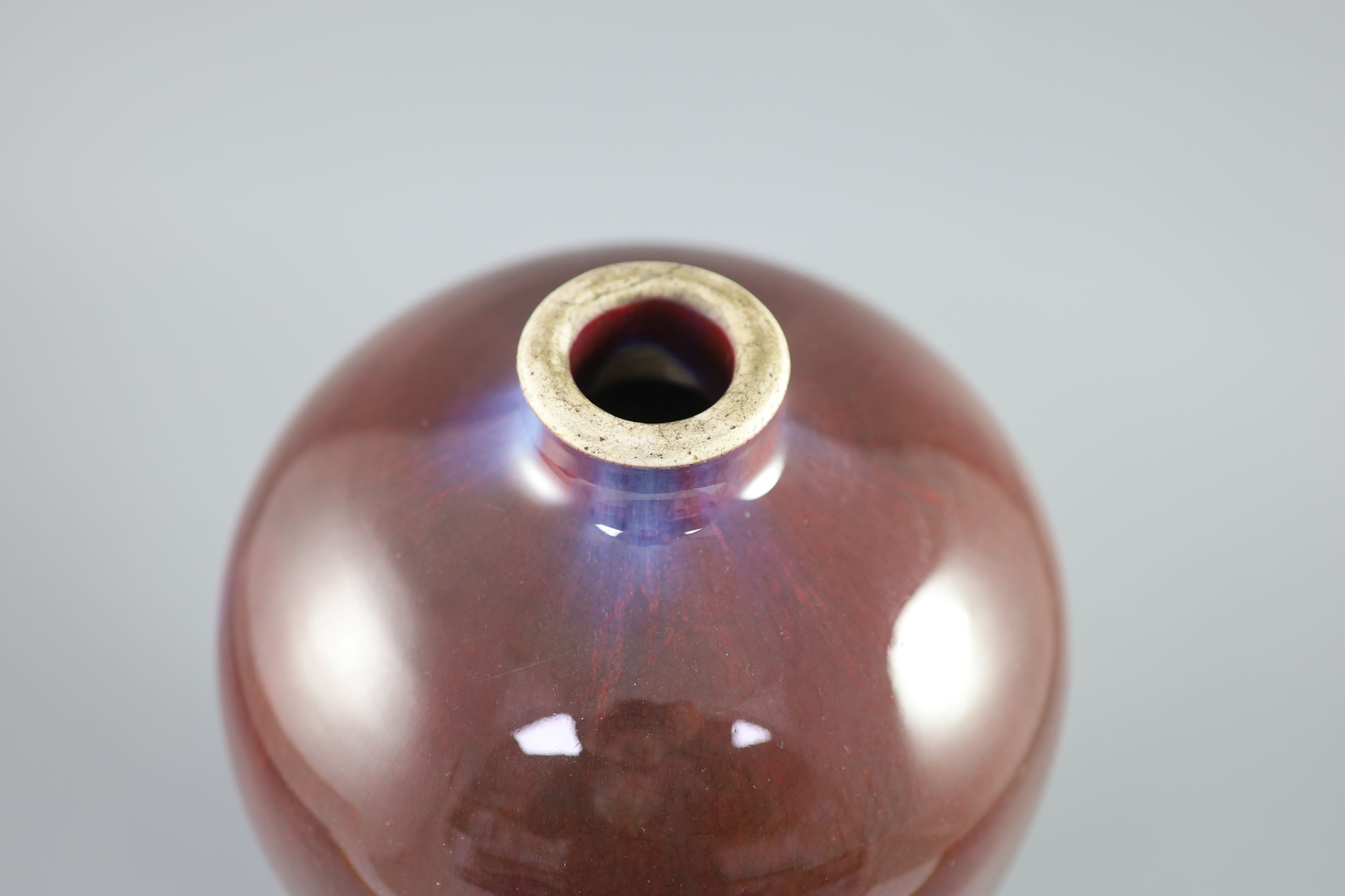 A large Chinese flambe meiping, 18th century, 35cm high, rim ground off
